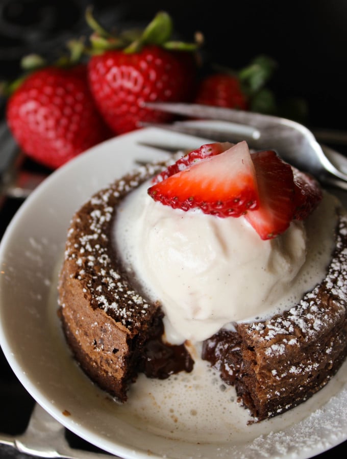molten chocolate cake with ice cream and strawberries