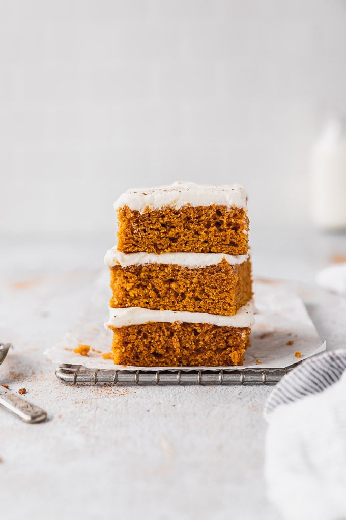 Three pumpkin bars stacked on top of each other.