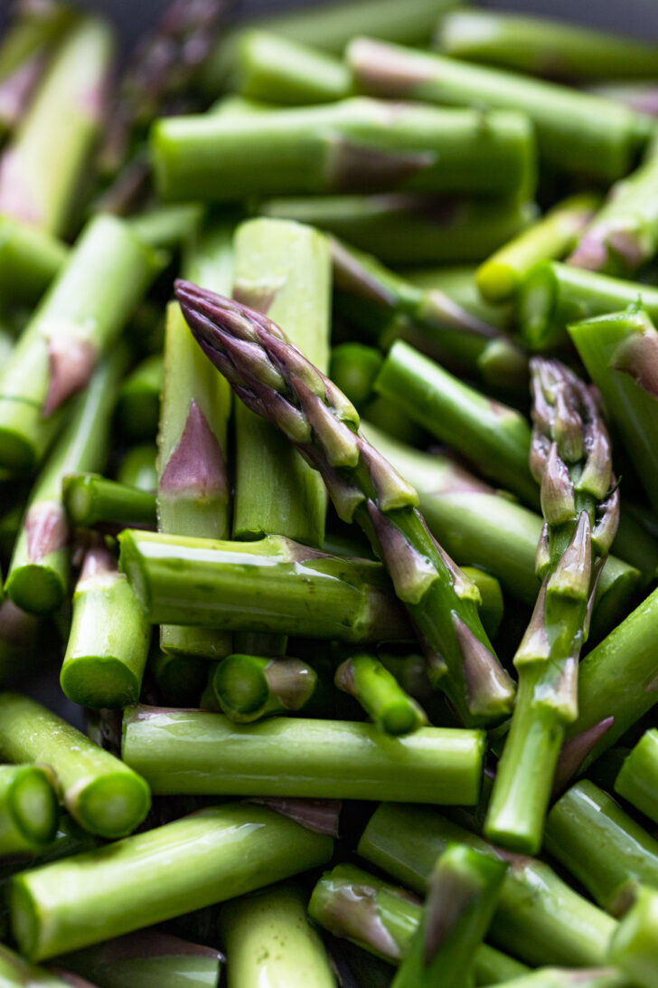 Asparagus chopped into bite-sized pieces.