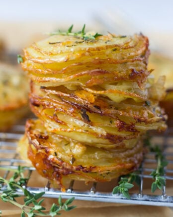 Gruyere and Thyme Stacked Potatoes - a recipe perfect for a Thanksgiving side or appetizer! | Fork in the Kitchen