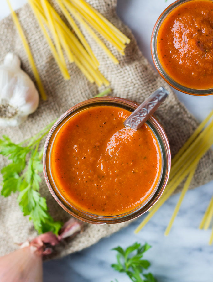 No more store-bought jars of tomato sauce - this classic tomato sauce recipe is full of flavor, comforting herbs, and freezes so you can have homemade tomato sauce anytime! | Fork in the Kitchen
