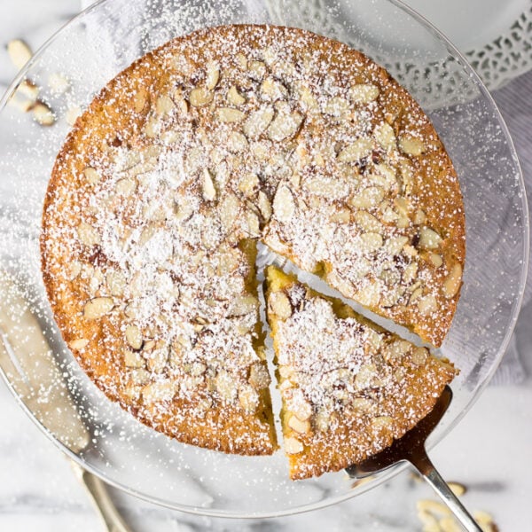 Almond Cardamom Cake is light and moist with strong almond flavor and a subtle complex cardamom flavor - excellent with coffee and best served warm with a sprinkle of powdered sugar!
