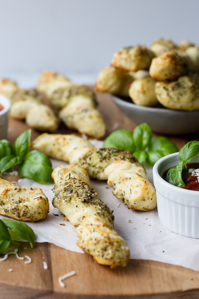 Ultimate Garlic Herb Breadsticks - Twisty breadsticks loaded with garlic butter, Italian herbs, and parmesan cheese - an excellent side or appetizer! | Fork in the Kitchen