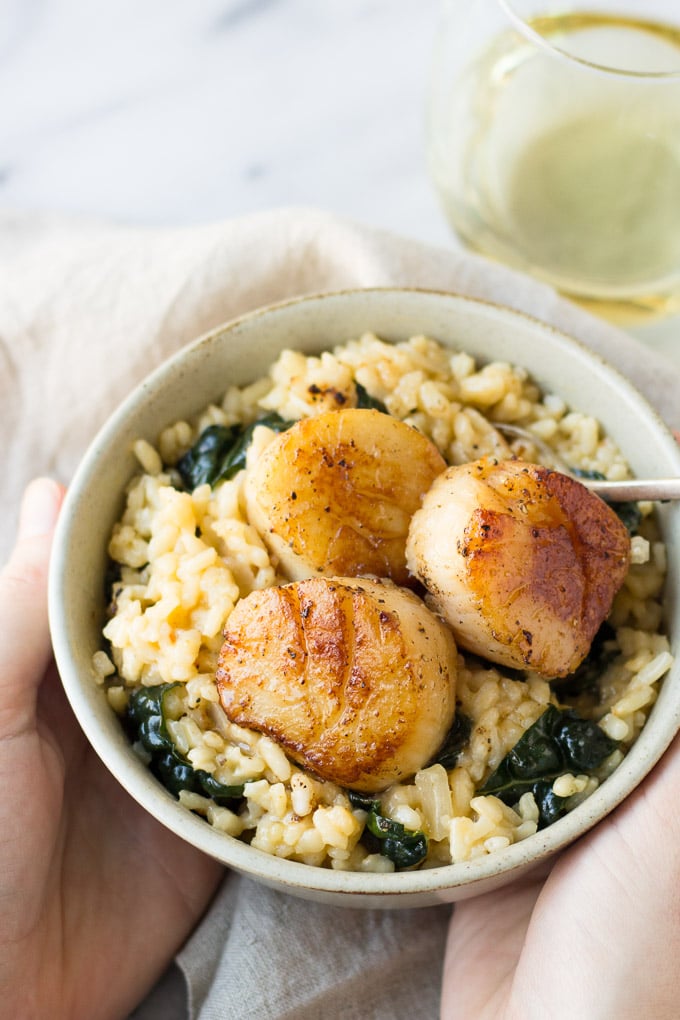 Parmesan Kale Risotto with Scallops for Two - A comforting, cheesy, creamy risotto packed with nutritious kale and melt-in-your-mouth scallops! Perfect for date night! | Fork in the Kitchen