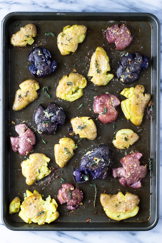 Crispy Garlic Roasted Fingerling Potatoes - An easy side dish ready in under 30 minutes - with crispy potato skins and a soft, melt-in-your-mouth interior, the combination of garlic butter and Fingerling potatoes is a winner! | Fork in the Kitchen