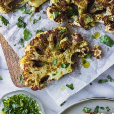 Roasted Cauliflower Steaks - a flavorful spice mix over creamy roasted cauliflower. A simple vegetarian dinner! | Fork in the Kitchen