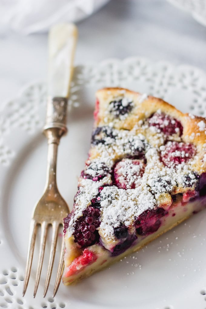 Triple Berry Clafoutis - An easy and elegant French dessert that's slightly sweet, made with your favorite summer fruits! | Fork in the Kitchen
