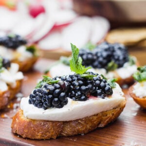 Blackberry Burrata Mint Crostini - the ultimate summer appetizer - easy and requires little prep work, full of fresh flavors, and pairs well with your favorite wine! | Fork in the Kitchen