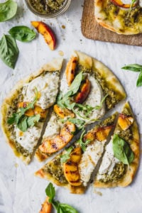 Grilled flatbread with peaches, burrata, and pesto makes for an easy weeknight dinner! #quick #summer #forkinthekitchen