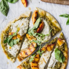 Grilled flatbread with peaches, burrata, and pesto makes for an easy weeknight dinner! #quick #summer #forkinthekitchen