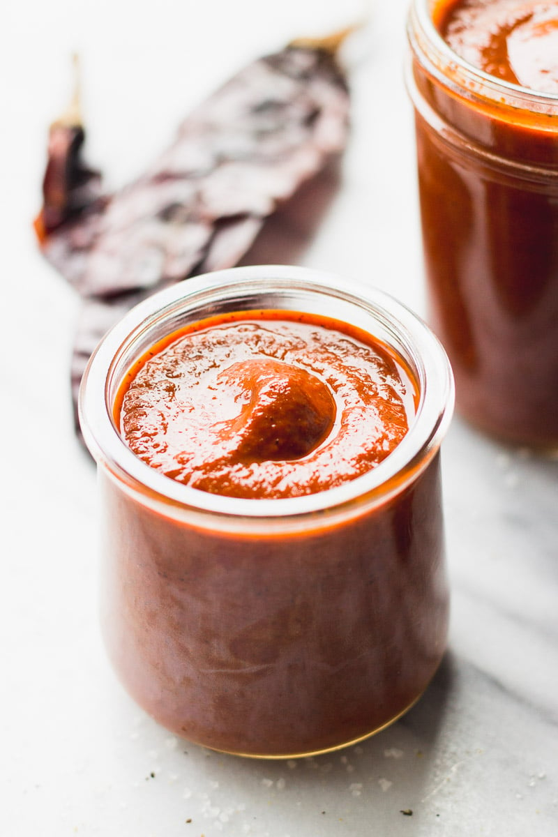 red enchilada sauce in a jar