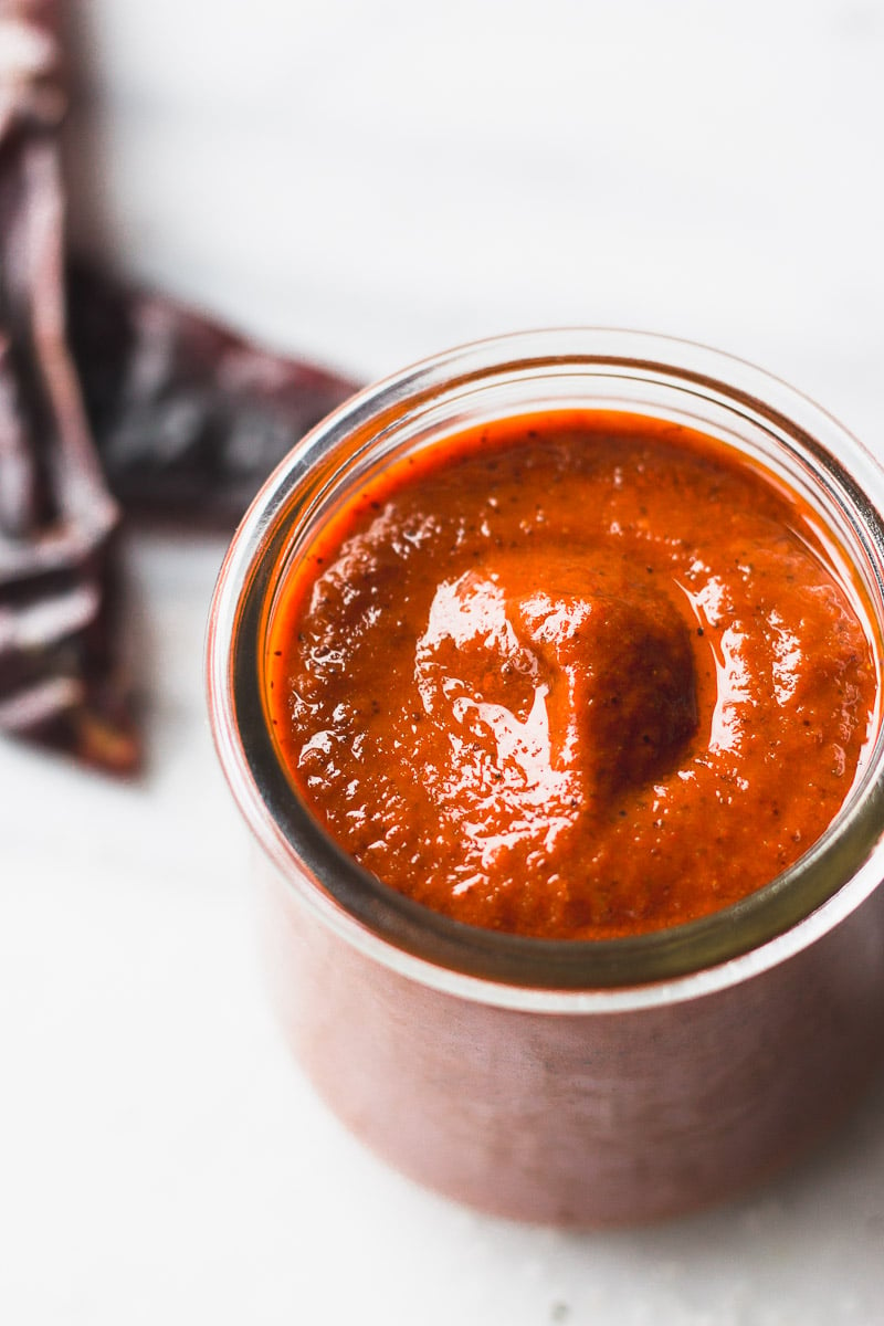 red enchilada sauce in a jar