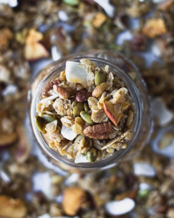 easy autumn spice granola in jar by fork in the kitchen