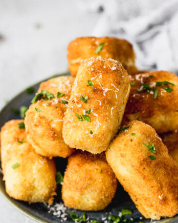 pile of potato croquettes on plate
