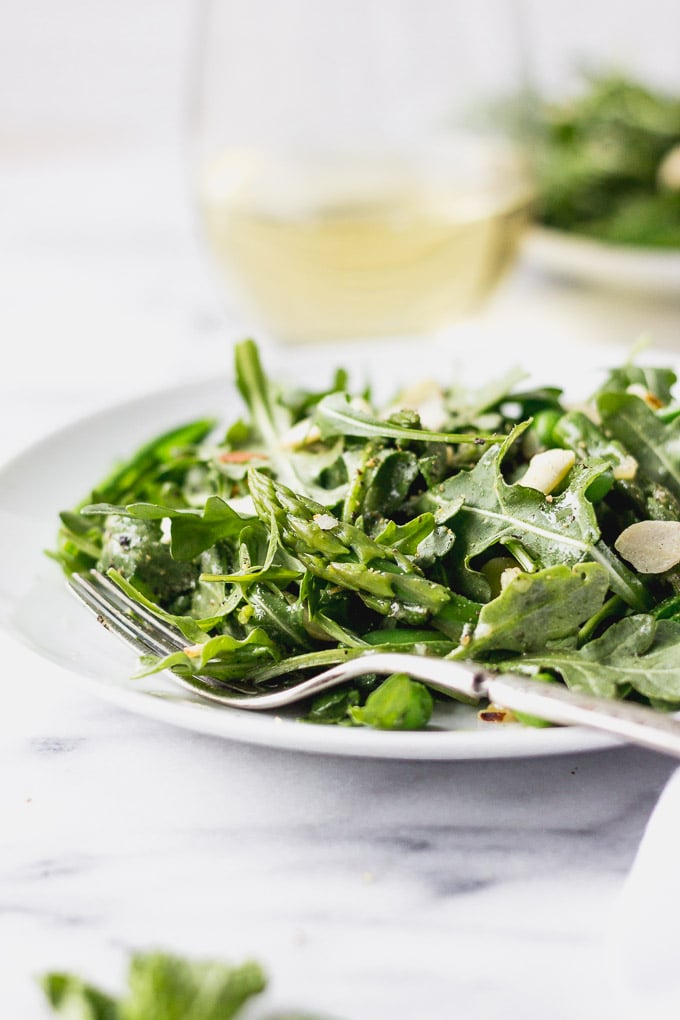 green vegetable salad with asparagus and peas in bowl