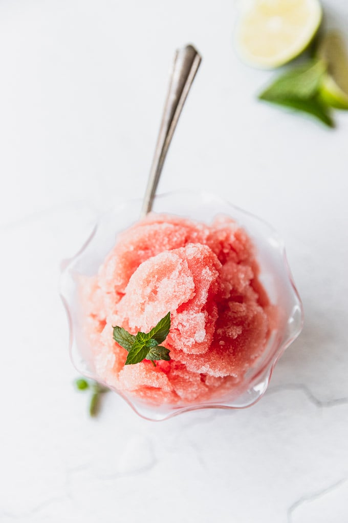 watermelon granita in serving bowl with spoon