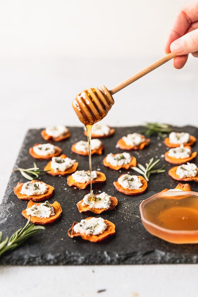 honey drizzle on herbed goat cheese