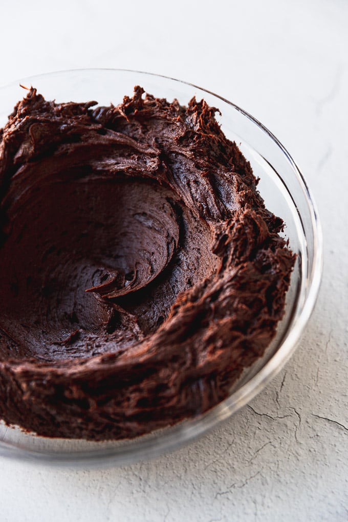 bowl of chocolate buttercream frosting
