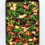 root vegetables on baking sheet roasted with kale