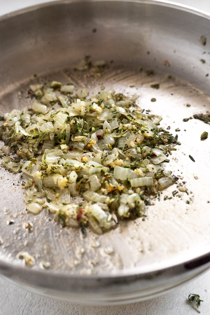 Onion mixture sauteed in skillet.