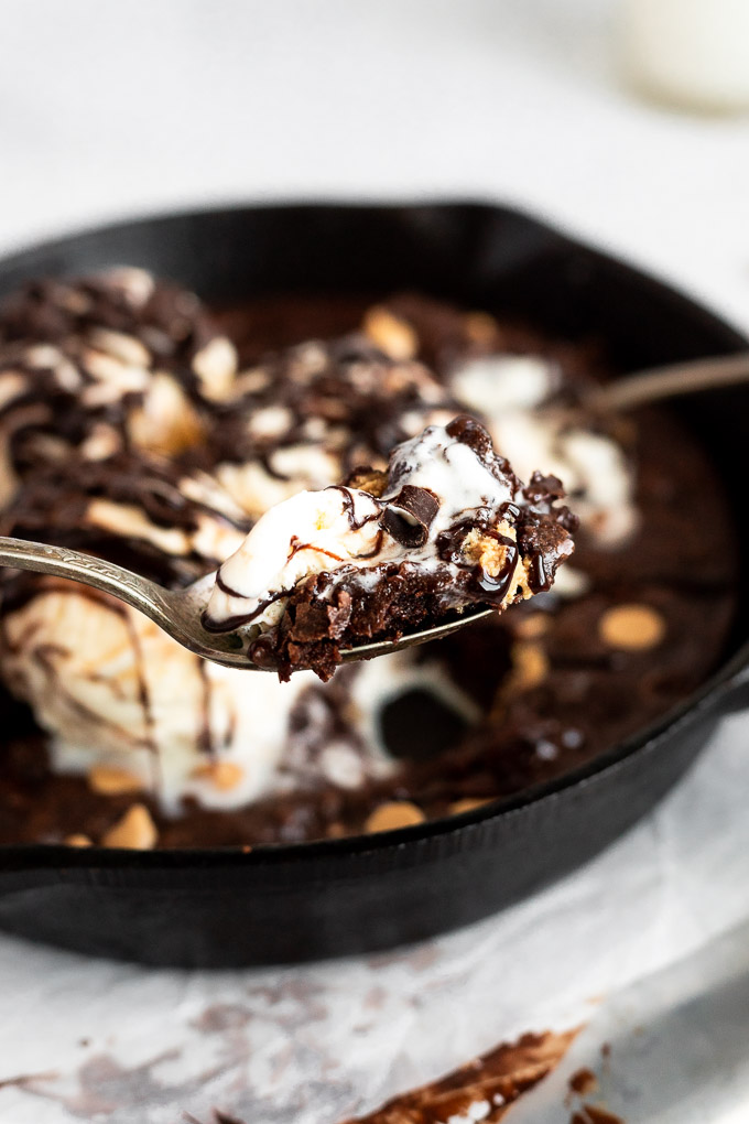 brownie bite with ice cream on spoon