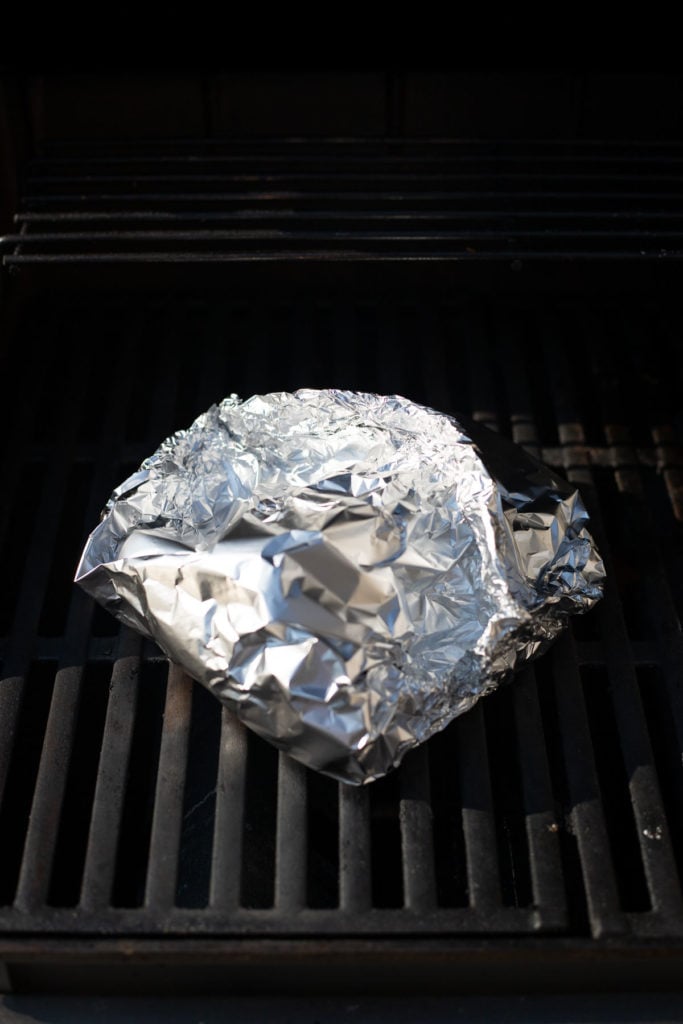 Foil packet on grill.