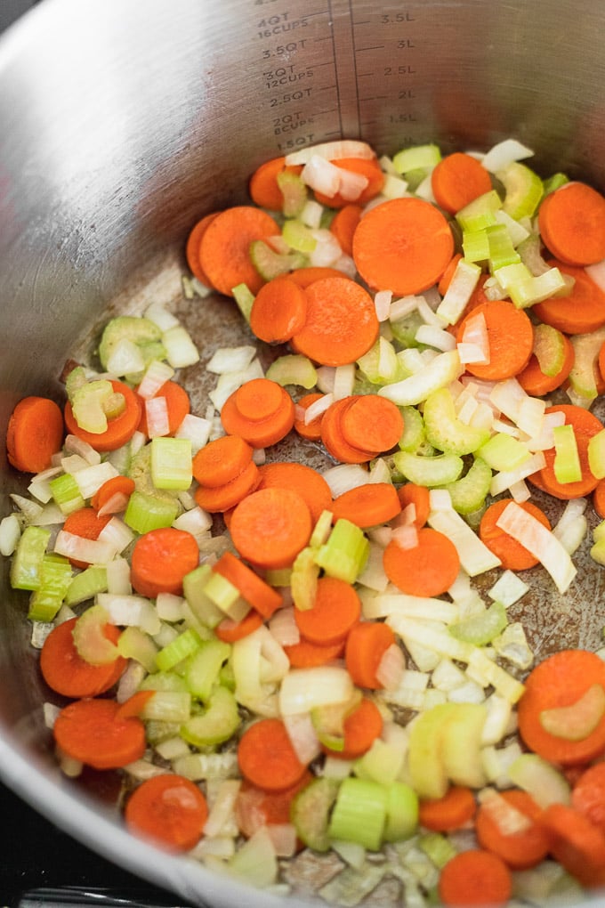 Pot with carrots, celery, and onion.