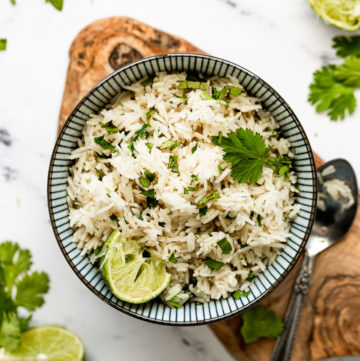 Cilantro lime rice in bowl on tray.