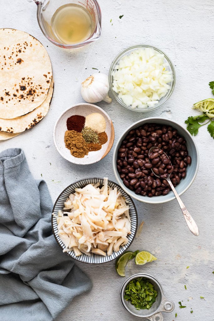 Bowls of ingredients for jackfruit tacos.