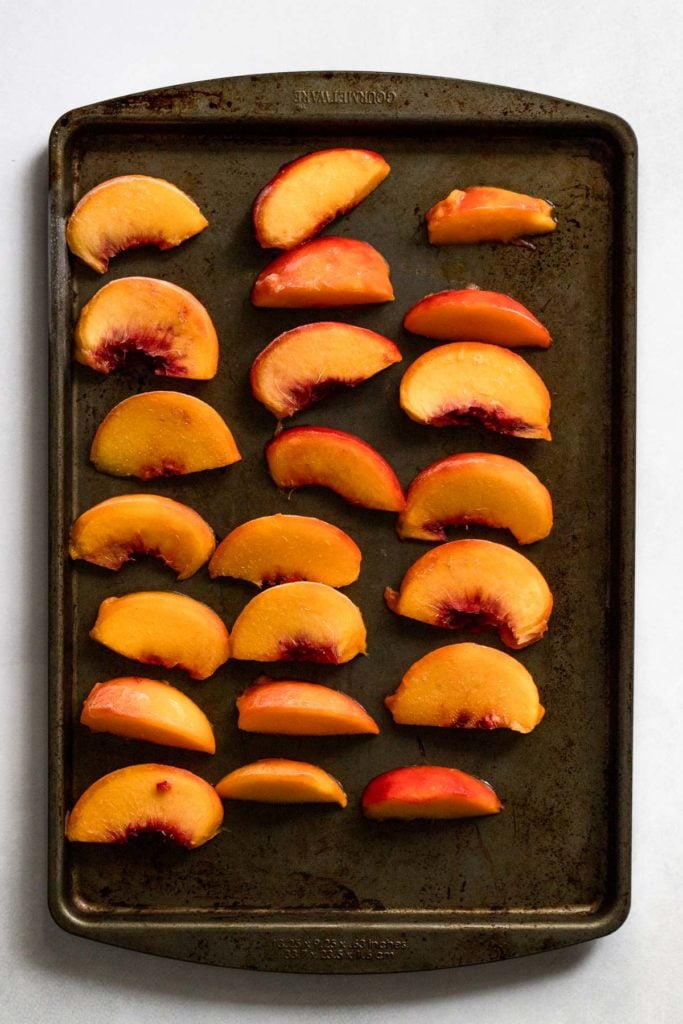 Tray of frozen peach slices