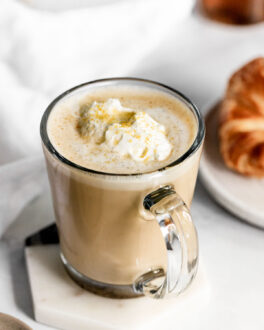 Vanilla latte with whipped cream.