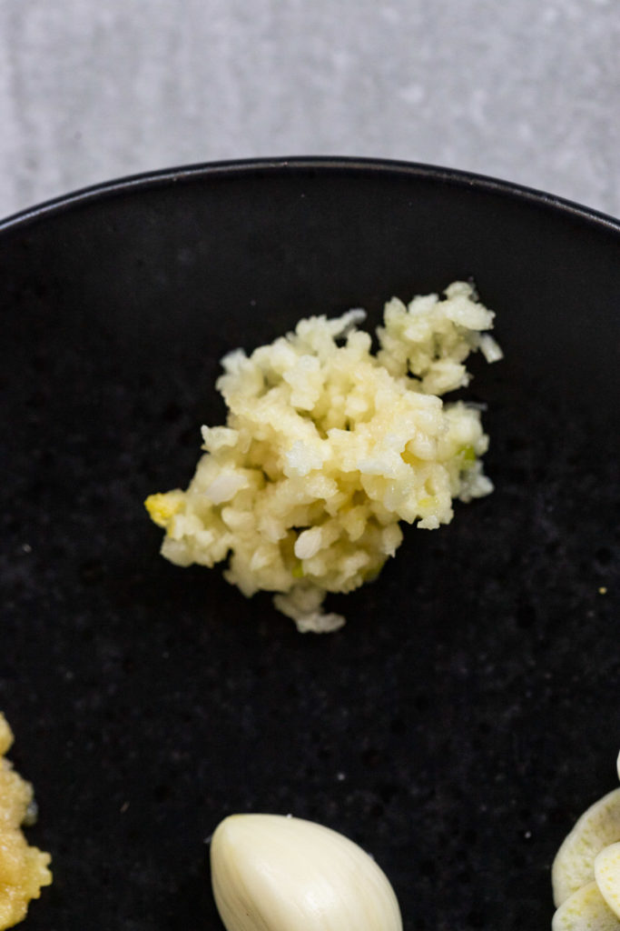 Minced garlic on plate.