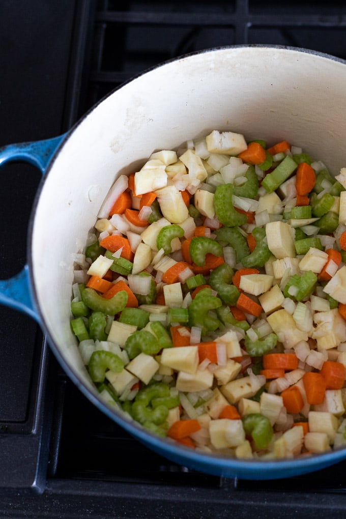 Mirepoix and parsnips in Dutch oven.