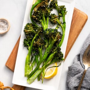 Air fryer broccolini on platter.