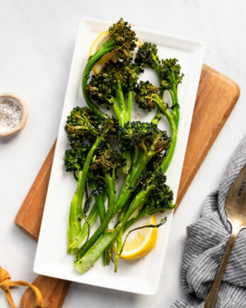 Air fryer broccolini on platter.