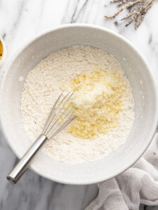 Bowl of flour and lemon zest mixture.