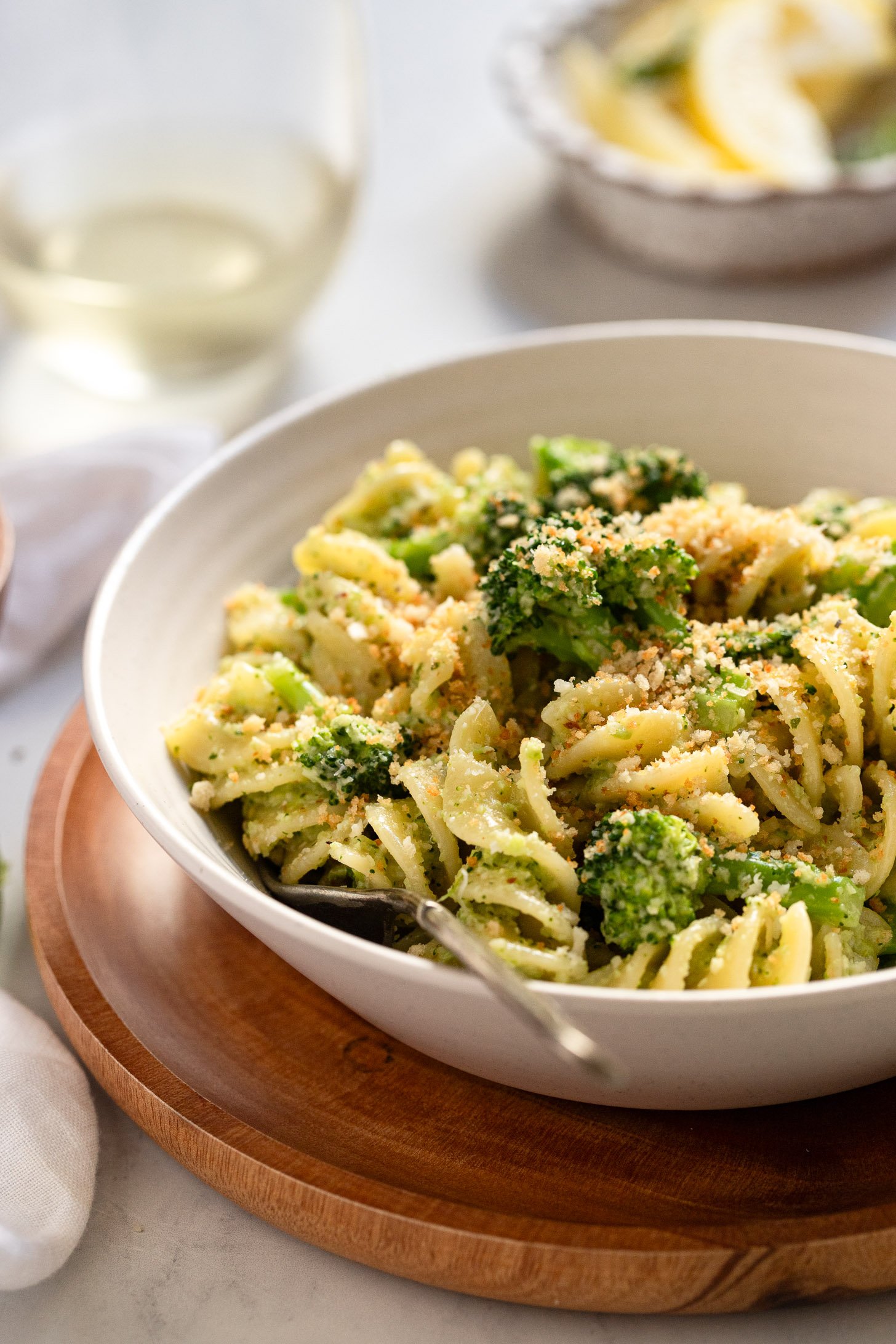 Broccoli pesto pasta side view in bowl.