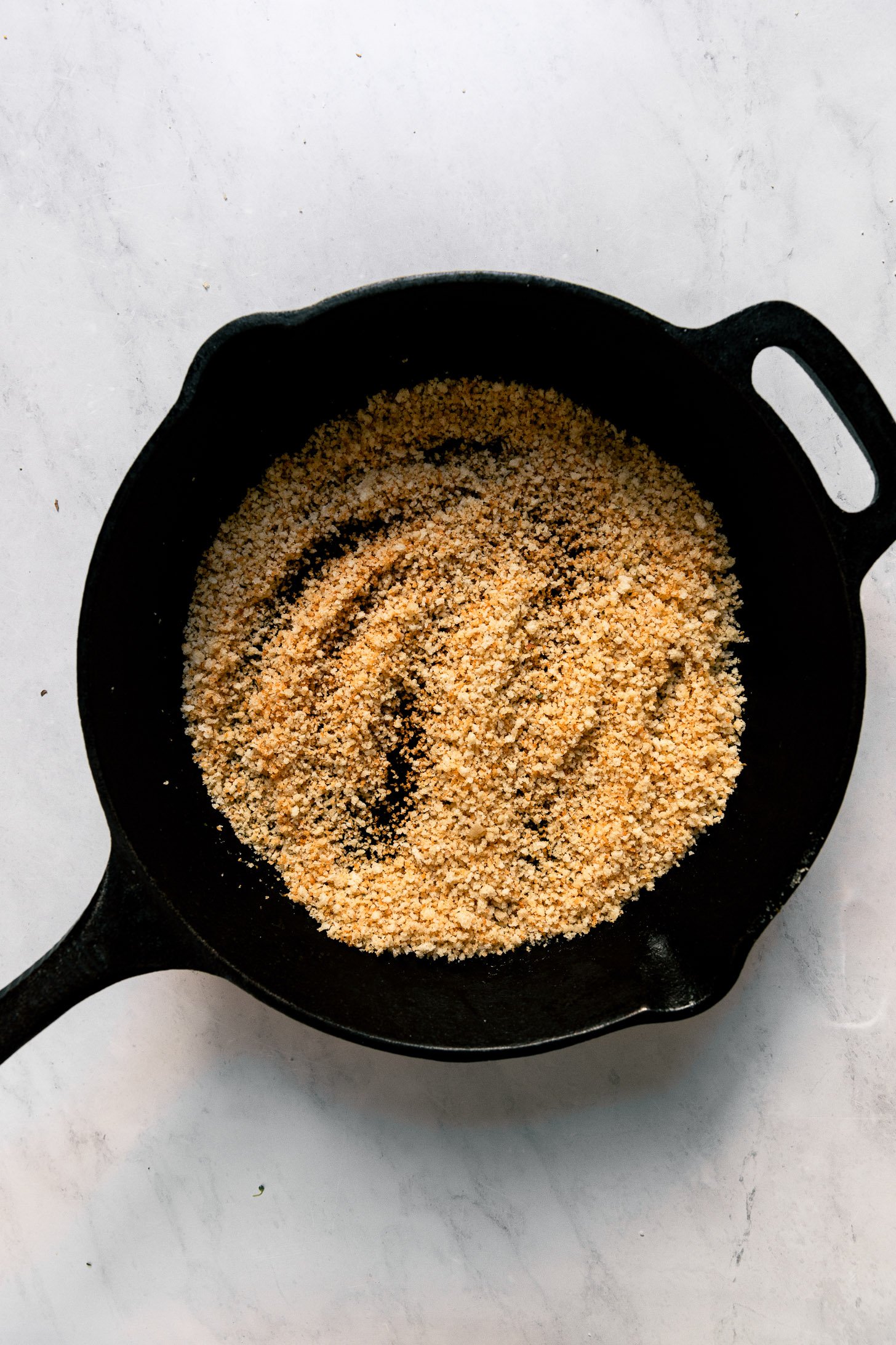 Skillet with panko after toasting.